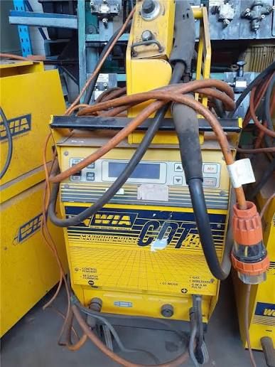 A WIA CDT welding power source and wire feeder still in use in a workshop