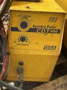 A WIA Synchro Pulse CDT 450 remote control box mounted on a welding machine in a workshop